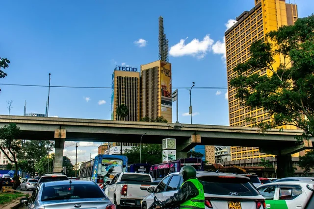 Street traffic beneath high-rises in Nairobi