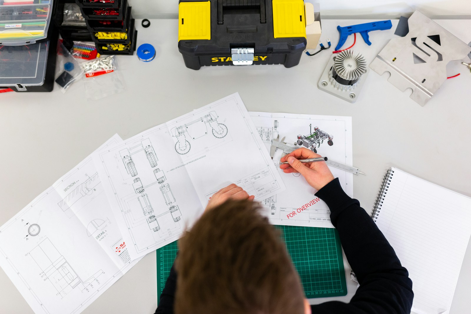 Engineering team reviewing electrical project information